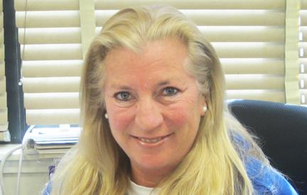  Mrs. Pickard, PE teacher, also coordinates Impact