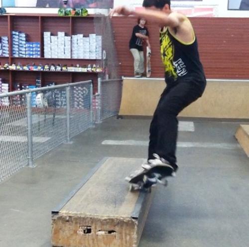 Remy Navar salad grinding a box at Shoe City 