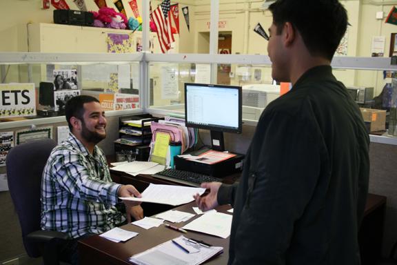 A student gets a work permit hoping to find employment.  The new increase in the minimum wage may make work more tempting for some students.